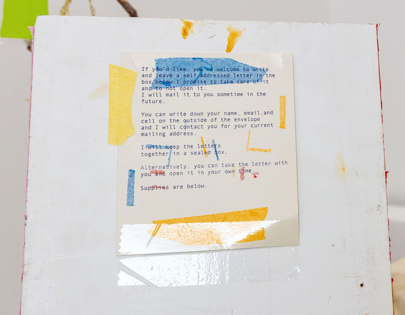 Letter Writing Station Instructions (detail), 2022. My summer clothes, found and borrowed furniture and objects, wood, riso print, tree branch, cardboard, string, and fabric; 55 x 45 x 27 in. Photo: Meghan Olson.