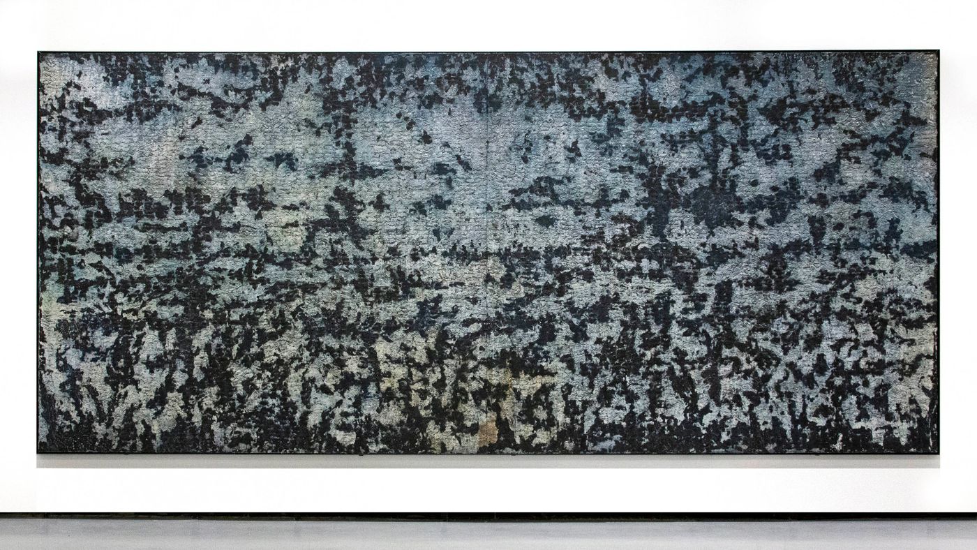 To the Cycles of Frost and Thaw, 2021-2022. Oil, calcium carbonate, graphite, polymer, silver nitrate, and ferrous oxalate on canvas with steel frame; 217 x 97 in. Photo: Allison Minto.