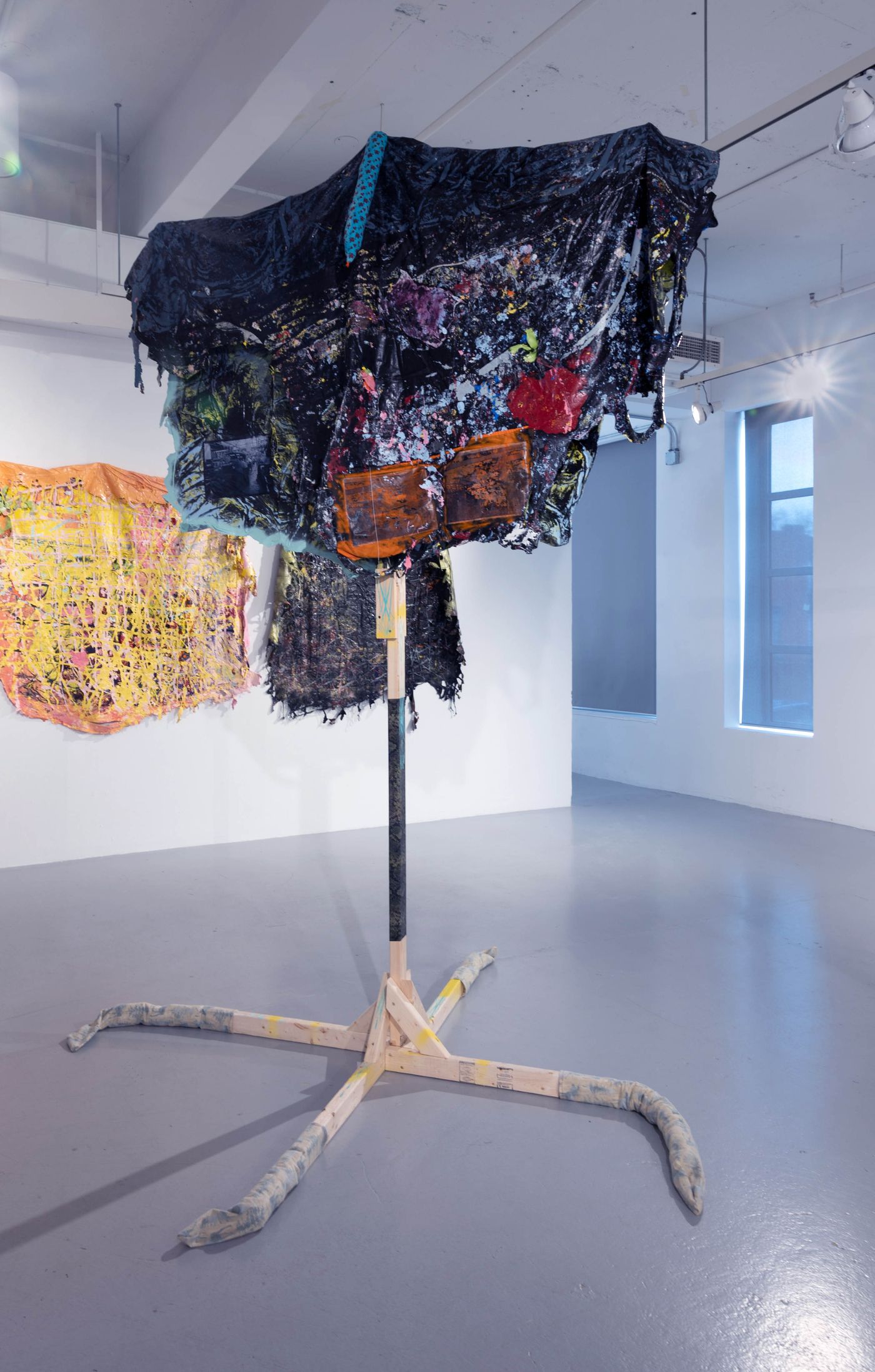 Administrator: 2584, 2021. Wood, flannel, polyester, cotton, yarn, inkjet prints, enamel, charcoal, nails, acrylic latex paint; 114 x 84 x 96 in. Photo: Allison Minto.