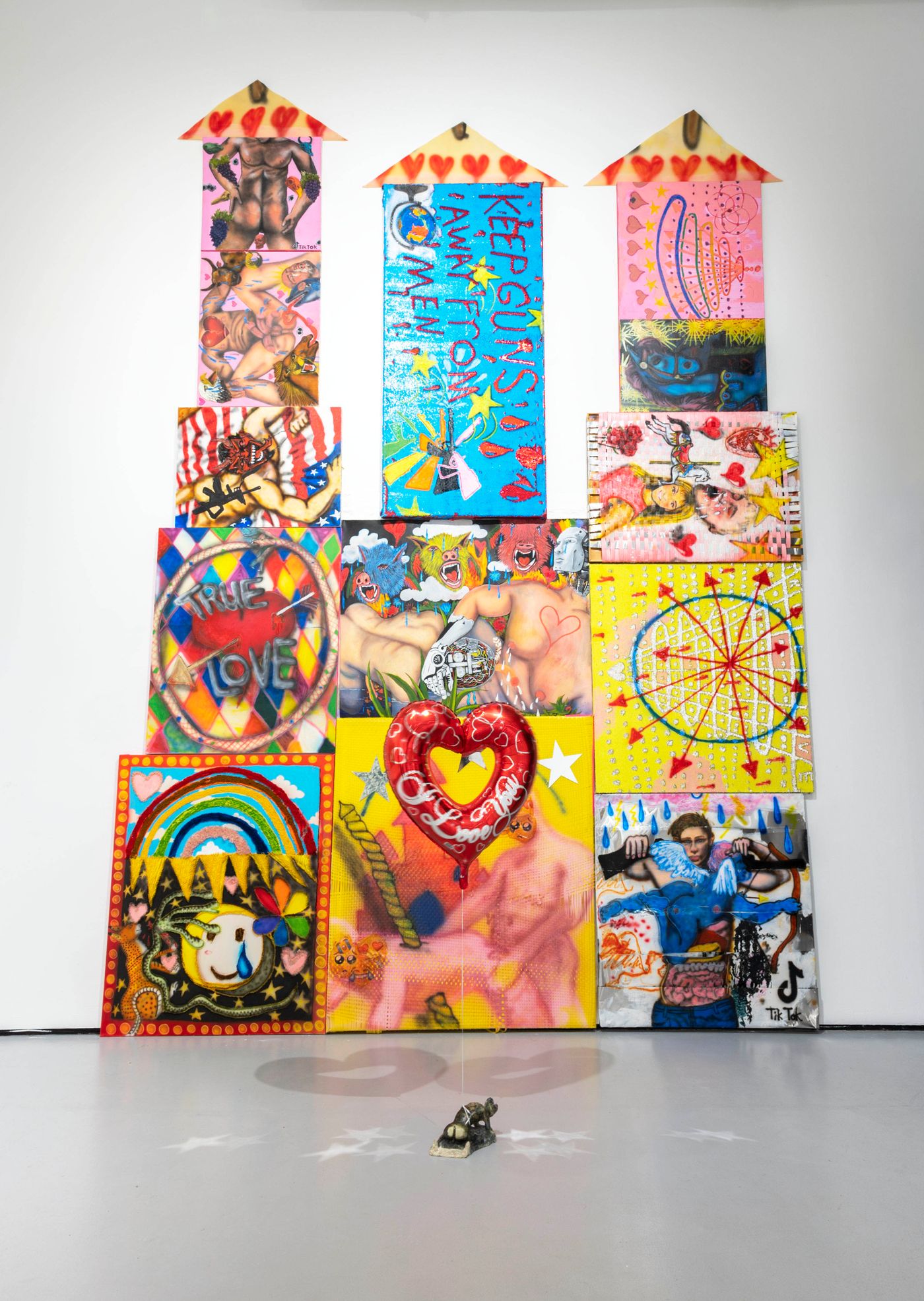 Amora Obscura/Memoria Castrum/Amor Fati, 2020-2022. Oil, acrylic, acrylic wool, waterslide decal, sequins, vinyl, on wood, canvas, and aluminum; dimensions variable. Photo: Allison Minto.