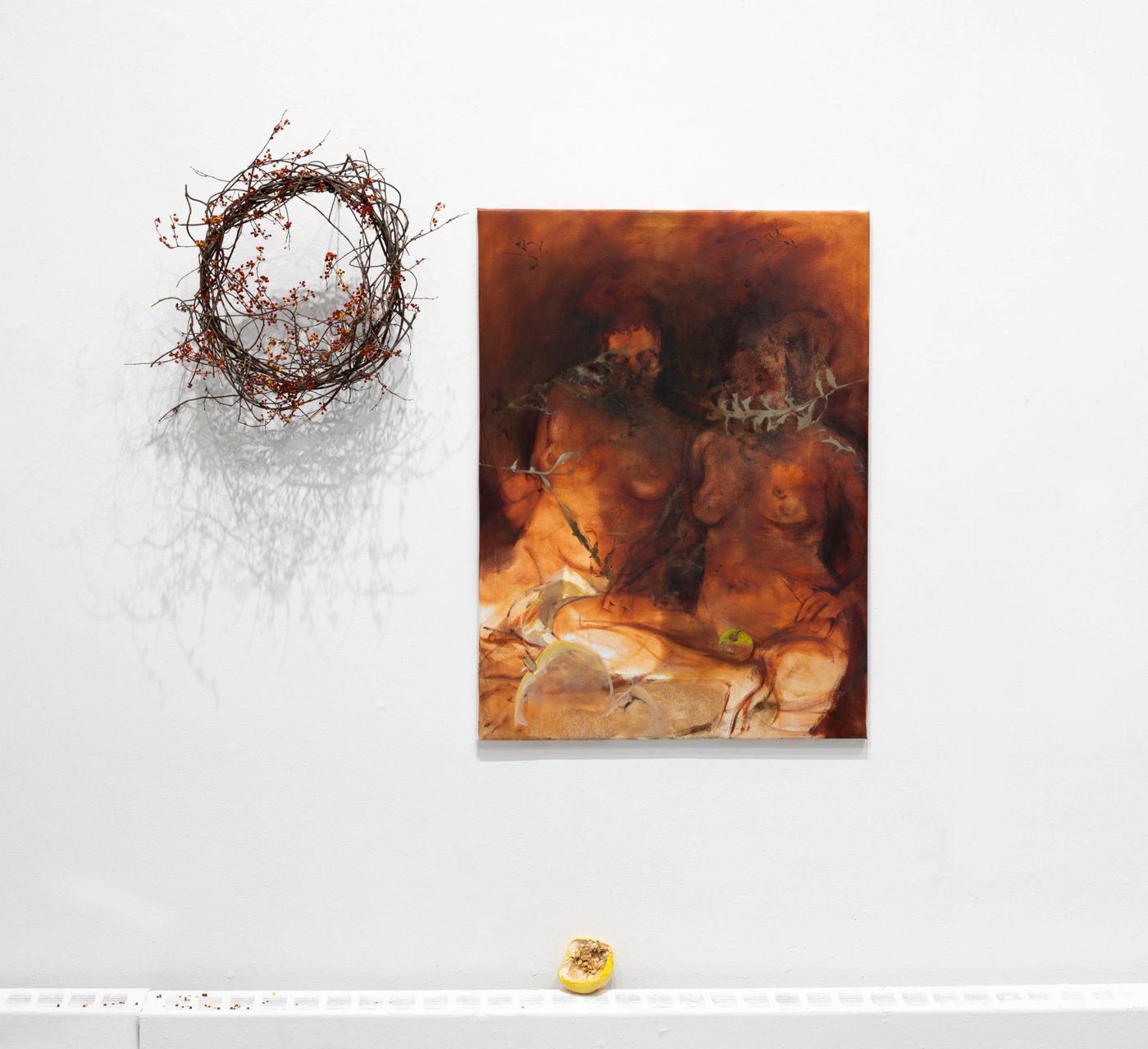 Bittersweet with Terrestrial Twins Portal and Pumpkin, 2022. Bittersweet wreath, oil on canvas, new moon pumpkin; 21 x 21 in., 37 x 50 in., and 5 x 5 in. Photo: Allison Minto.